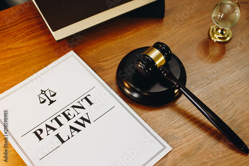 Patent Law legal documents with gavel at the side