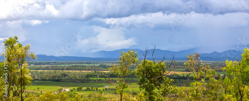 Storms over hills on the Atherton Tableland in Queensland, Australia photo