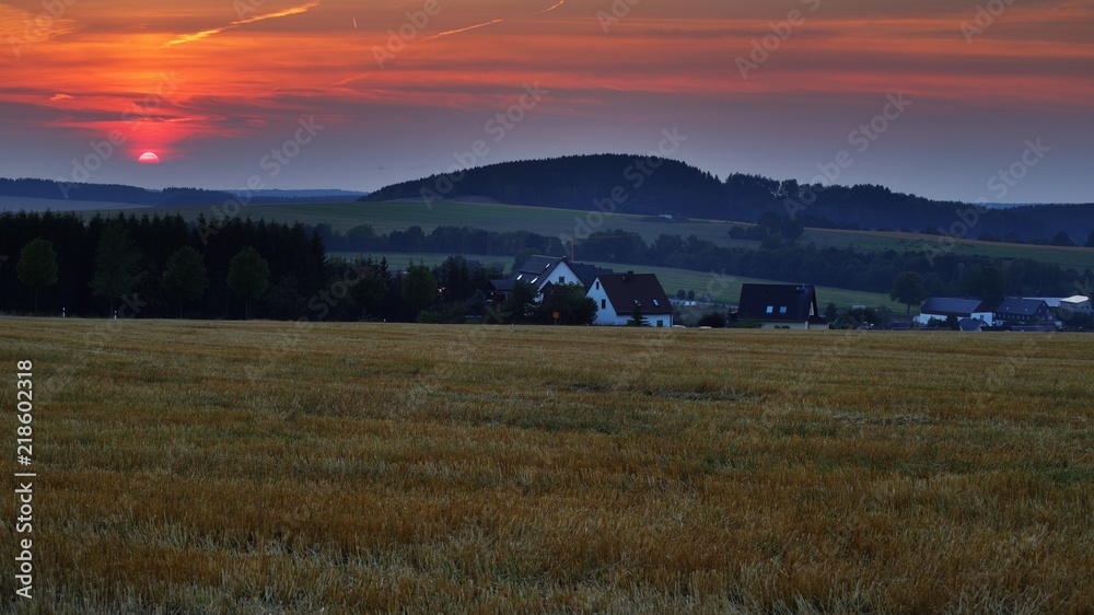 Obraz premium sonnenuntergang in auerbach im erzgebirge