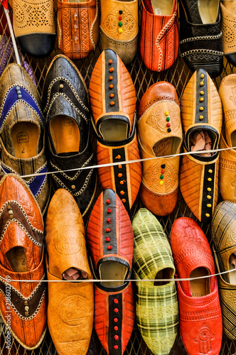 Colorful pointy shoes in market