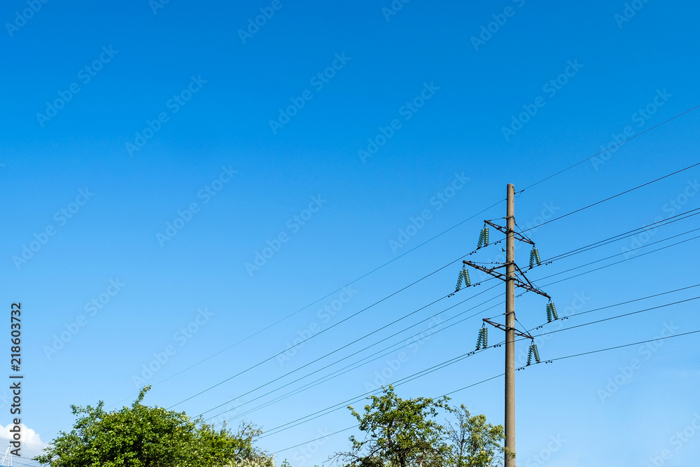 Obraz premium high voltage post.High-voltage tower sky background.