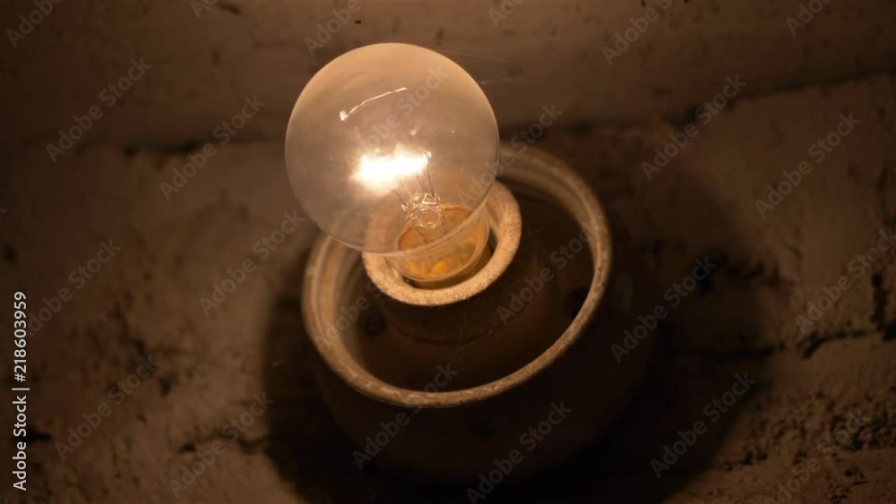 Light bulb in basement in 4k slow motion Light bulb in basement in 4k slow motion