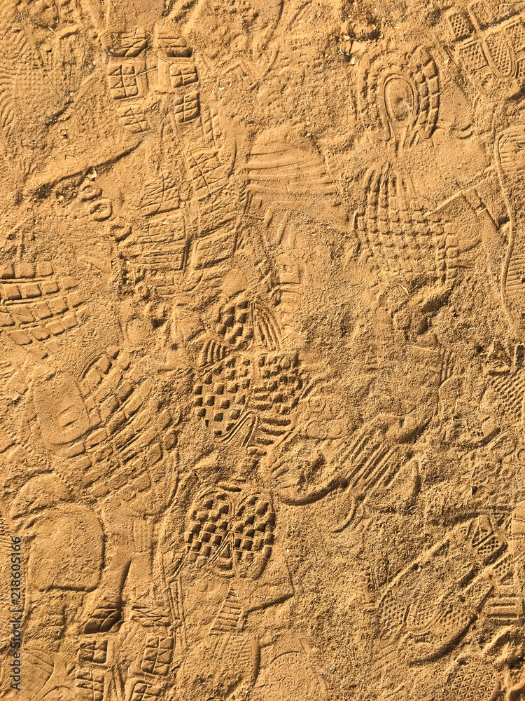 Many footprint on the sand beach texture background. Many footprint on the sand beach texture background.