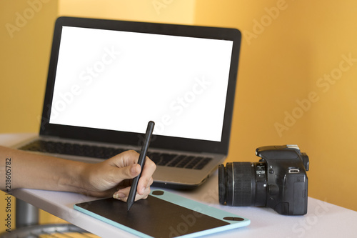 Executive working with multiple devices	 photo