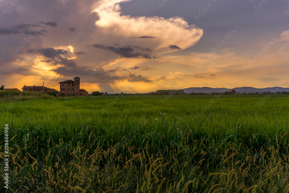 farmhouse in the countryside at sunset farmhouse in the countryside at sunset