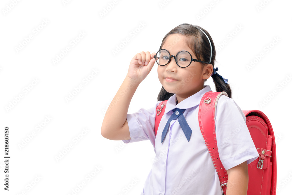 Happy little girl student wearing eyeglasses and schoolbag isolated on white background, back to school concept