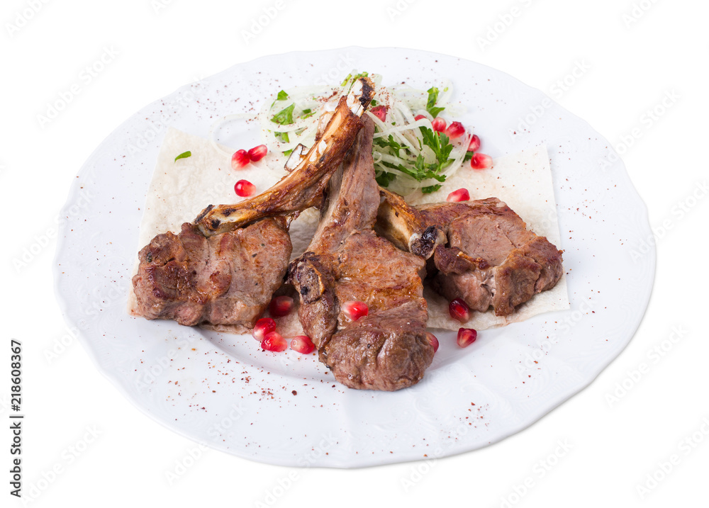 Delicious lamb racks on pita.