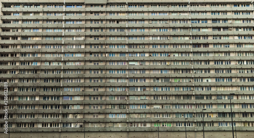 Socialist-era housing in Katowice, Poland. View of numerous windows in multistory residential block house