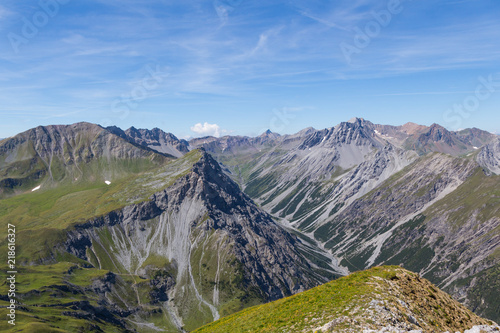 Welschtobel canyon in Schanfigg, Switzerland with blue sky and mountains photo