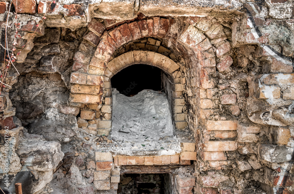 Old abandoned brick oven outside. 