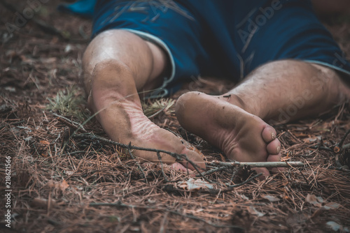 corpse of a man in the woods photo