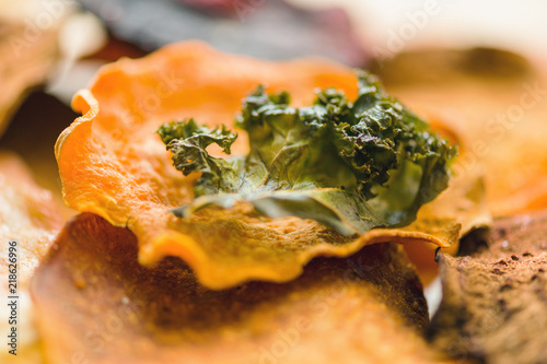 Healthy Homemade Vegetable Chips  of beet,  blue potato and carrot. Background and texture photo