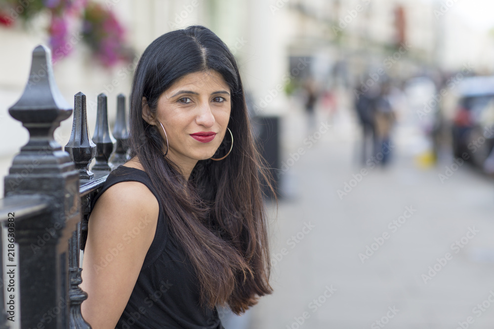 Portrait of a beautiful indian woman on a London street