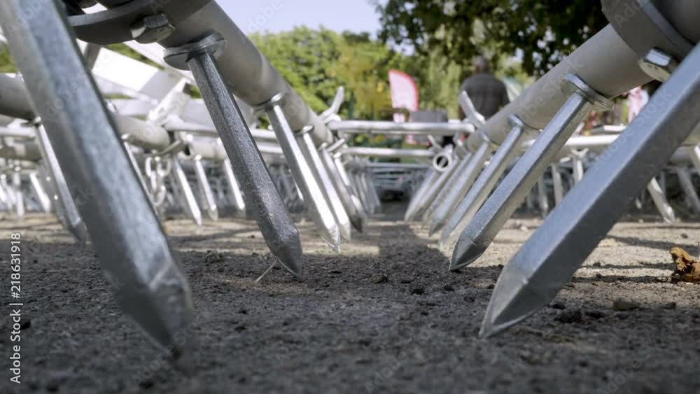 Two rows of large and sharp harrow teeth. Harrow for soil treatment Two rows of large and sharp harrow teeth. Harrow for soil treatment