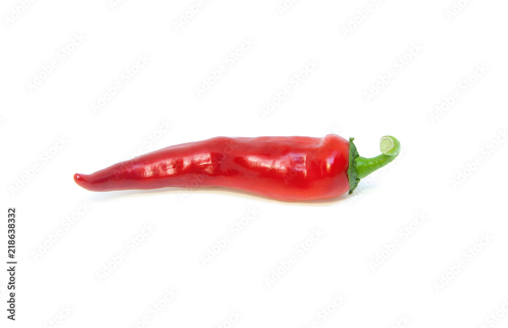 Chili. Two red pepper with a green tail on a light background. Bright and spicy vegetable.