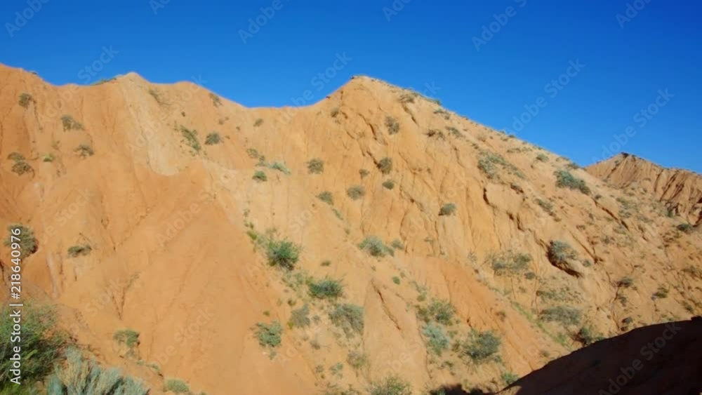 Fairy Tale Canyon, rock formations on the Issyk-Kul lake. Kyrgyzstan.Central Asia Fairy Tale Canyon, rock formations on the Issyk-Kul lake. Kyrgyzstan.Central Asia