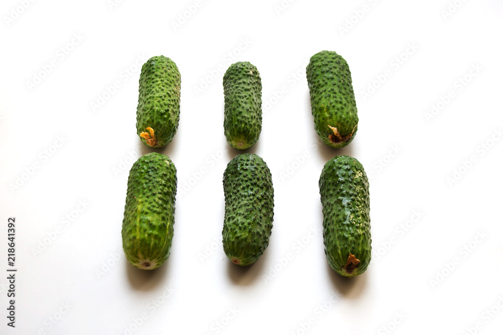 Fresh green cucumbers isolated on white background Fresh green cucumbers isolated on white background