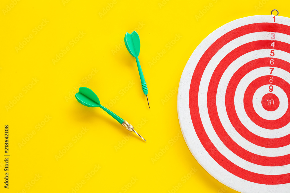 Dart arrow on target dartboard ,Business success concept. Dart arrow on target dartboard ,Business success concept.