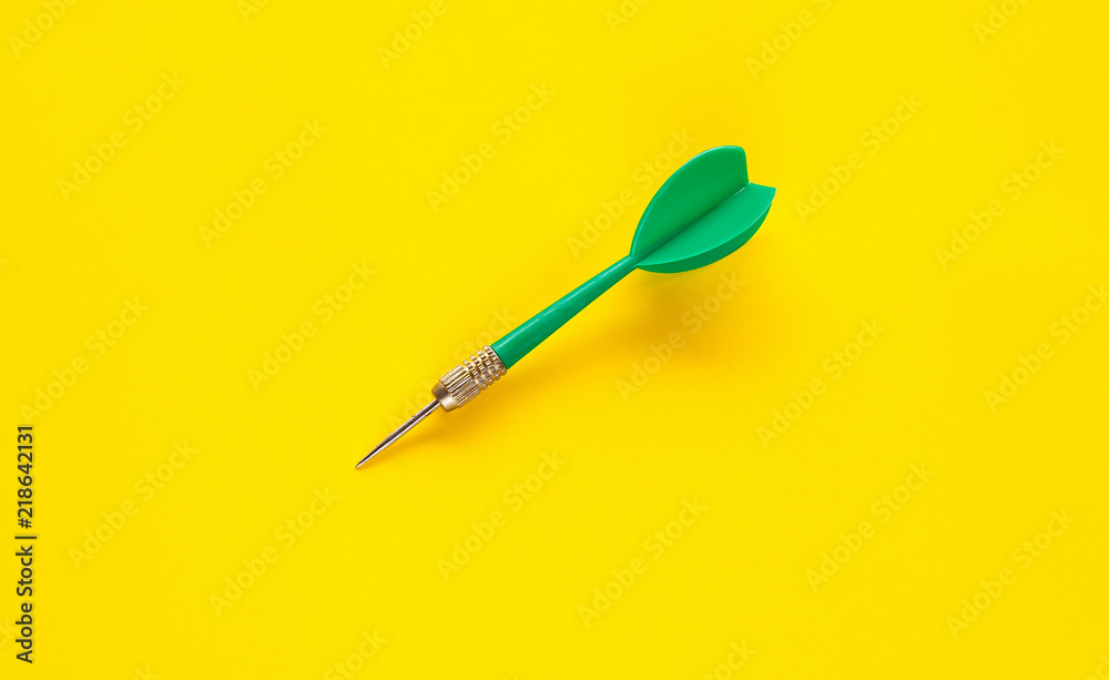 Dart arrow on color background ,Business success concept.
