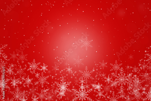 Beautiful white snowflakes on a  red background.