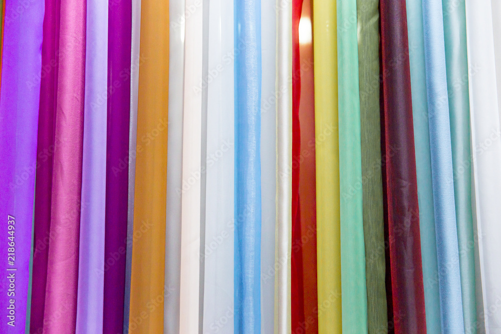 Rolls of fabric and textiles in a shop or store Rolls of fabric and textiles in a shop or store