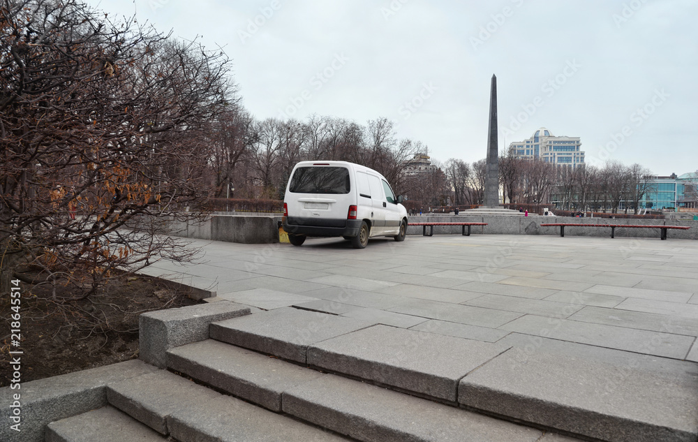 Kyiv, Ukraine. Car parked against the rules inside pedestrian zone of historical place because of lack of parking space in the city. Typical behavior of Ukrainian drivers ignored by police.
