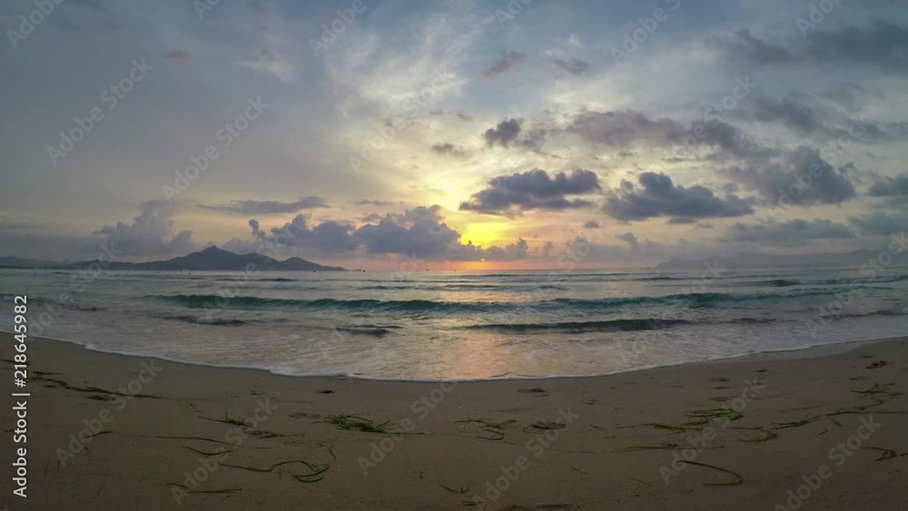 4K Timelapse Majorca Muro beach sunrise in Alcudia Bay. Mallorca at Balearic Islands of Spain 4K Timelapse Majorca Muro beach sunrise in Alcudia Bay. Mallorca at Balearic Islands of Spain