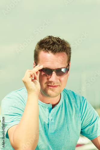 Portrait of handsome guy during summertime