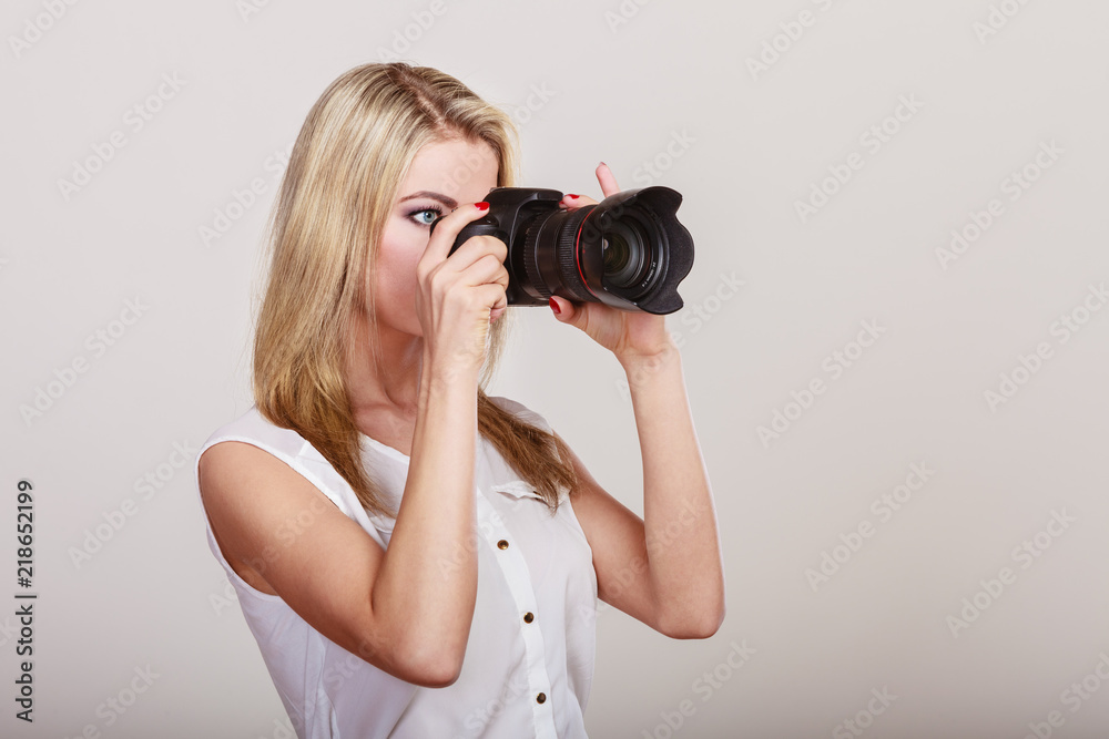 Photographer girl shooting images