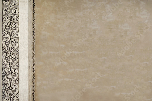  Light beige background with a pattern on the left side