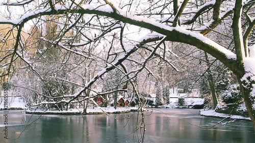 City park covered with snow after heavy snowfall photo