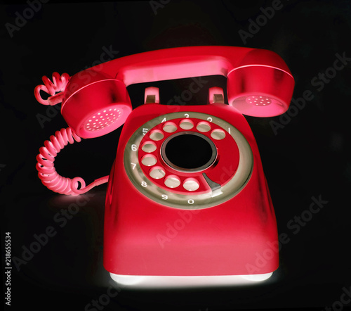 old red phone ringing of the hook photo