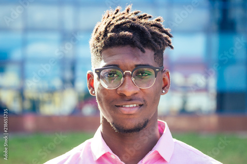 Fototapet portrait stylish and handsome African student American man with cool dreadlocks