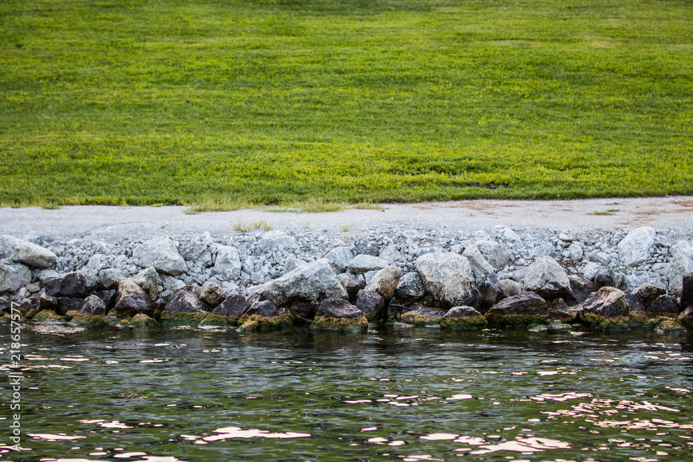 Fototapeta premium Mossy Rocks at the Lake