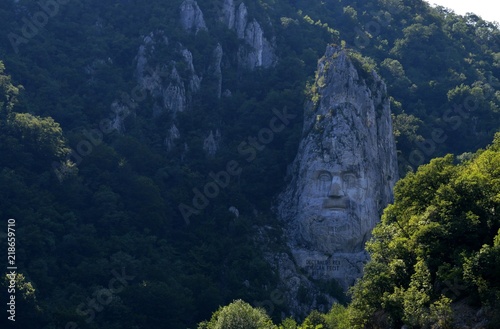 figure in stone on the wall  