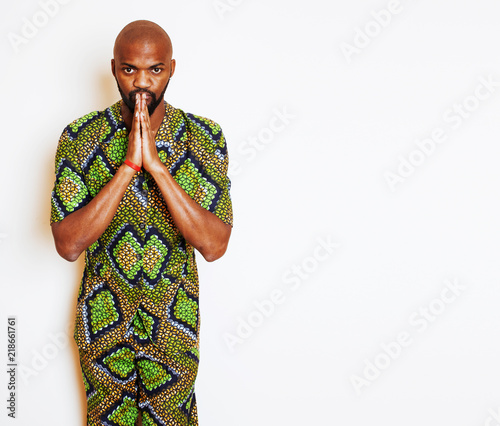 portrait of young handsome african man wearing bright green nati photo