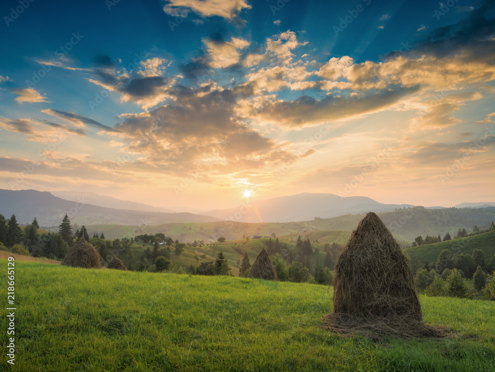 Majestic carpathian sunset in a mountain valley