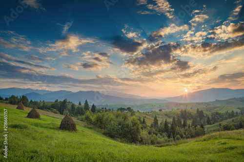 Majestic carpathian sunset in a summer mountain valley