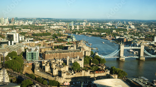London skyline at sunny day including Tower Bridgeat financial district. © offcaania