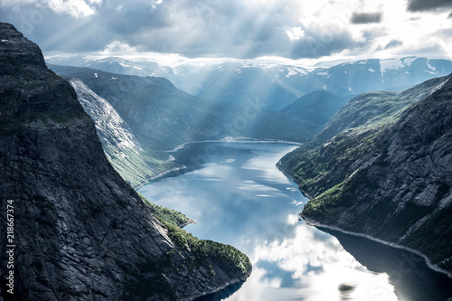 Beautiful fjord in Norway with amazing sun rays. View from the top photo