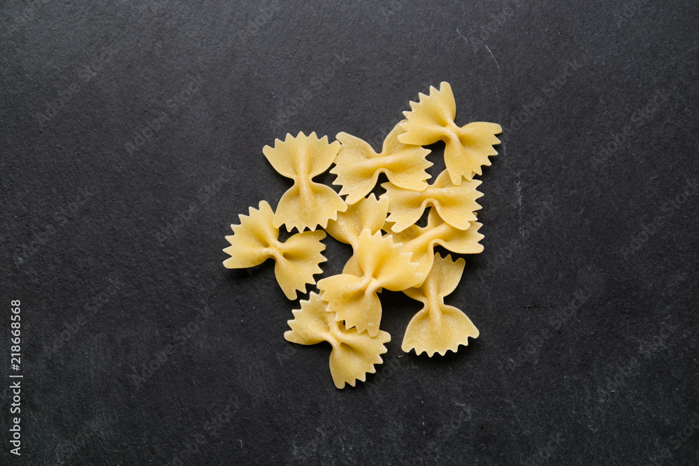 Heap of farfalle (butterfly-shaped pasta) Heap of farfalle (butterfly-shaped pasta)