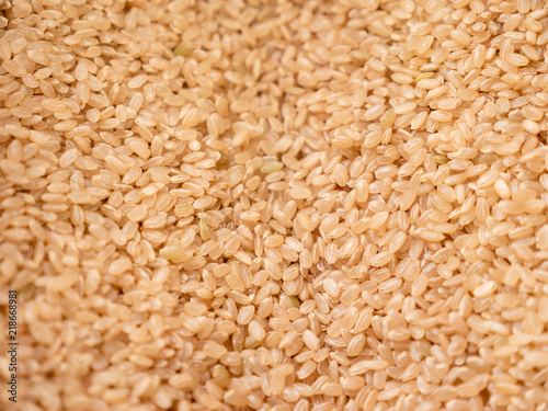 lot of brown rice texture, food background.