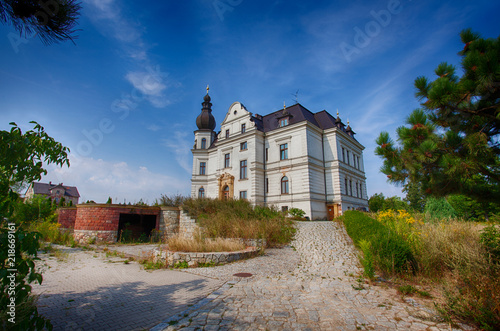 Palace in the village Biskupice Podgorne in summer