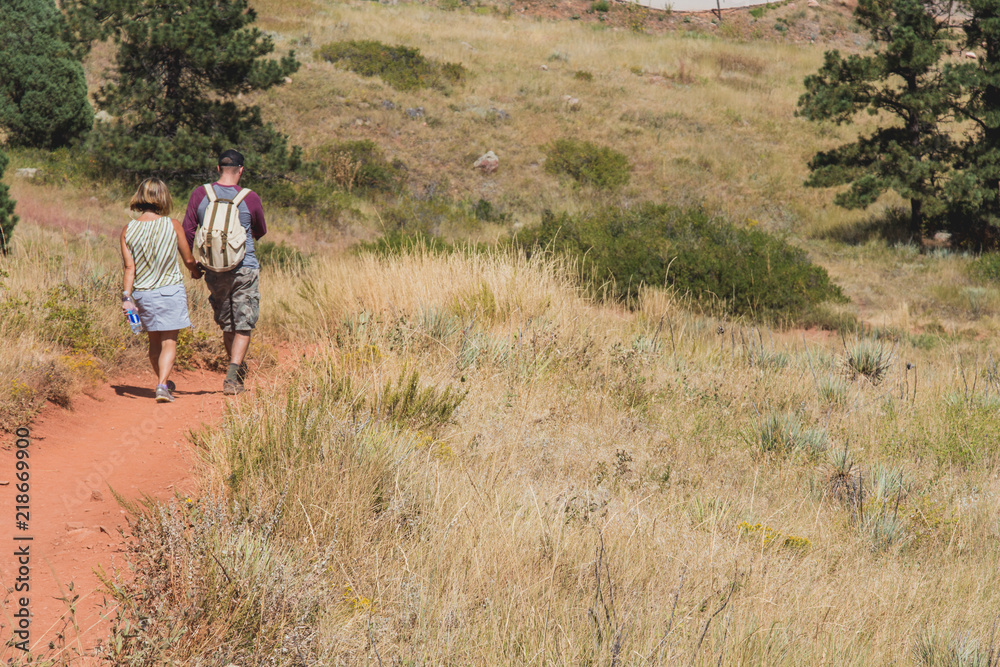 Couple along a dry path