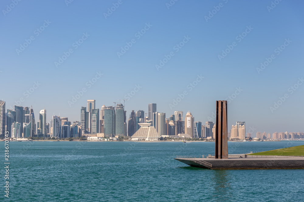 The skyline of Doha, Qatar, on a blue sky day, winter time, seen from the MIA Park