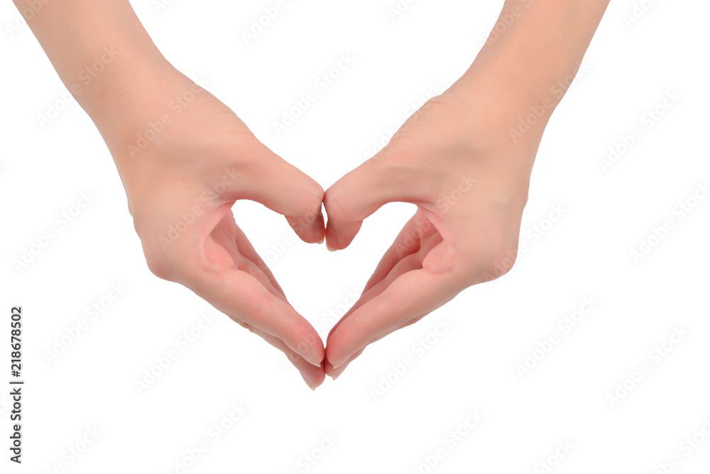 Close up of heart made by women hands with pale skin isolated on over white background Close up of heart made by women hands with pale skin isolated on over white background