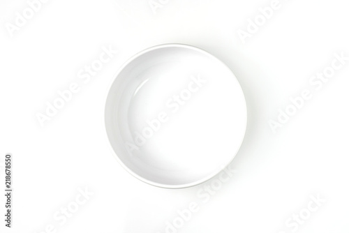 Empty White Ceramic Bowl isolated on White Background Use for Food Display. Top View.