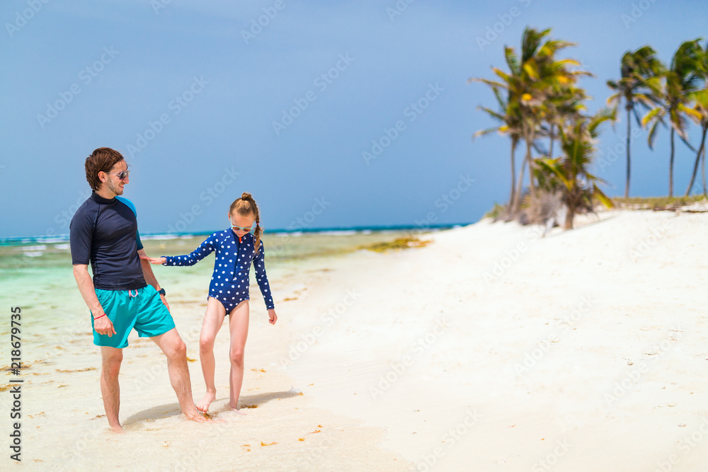 Father and daughter at beach