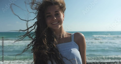 Smilling woman on the beach