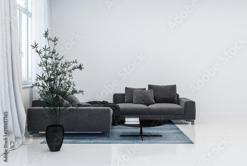 Black couch and plant pot in glossy white room